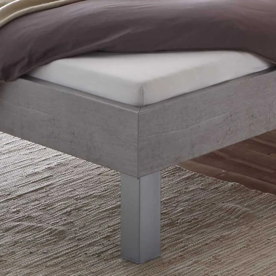 Bett in Betonoptik mit Kopfteil Kissen - Rienas