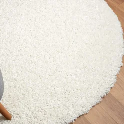 Cremefarbener Teppich mit hohem Flor - Vacance