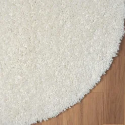 Cremefarbener Teppich mit hohem Flor - Vacance