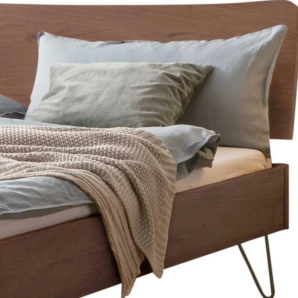 Doppelbett aus Nussbaum mit Stahlfüßen - Gedessa