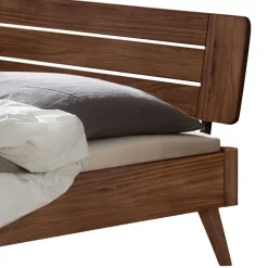 Dunkles Holzbett aus Nussbaum Massivholz - Vetonia