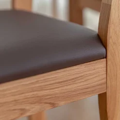 Esstischstuhl aus Wildeiche mit Kunstleder Sitz - Ernestan