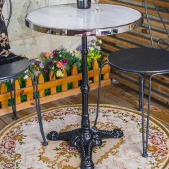 Runder Designtisch aus Marmor & Gusseisen - Perleberg