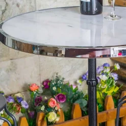 Runder Designtisch aus Marmor & Gusseisen - Perleberg