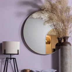 Runder Spiegel aus Metall in Gold - Megida