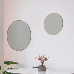 Runder Wandspiegel in Messingfarben - Mossora