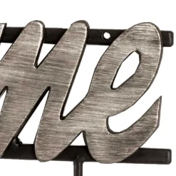 Schwarze Wandgarderobe mit Schriftzug - Geniale