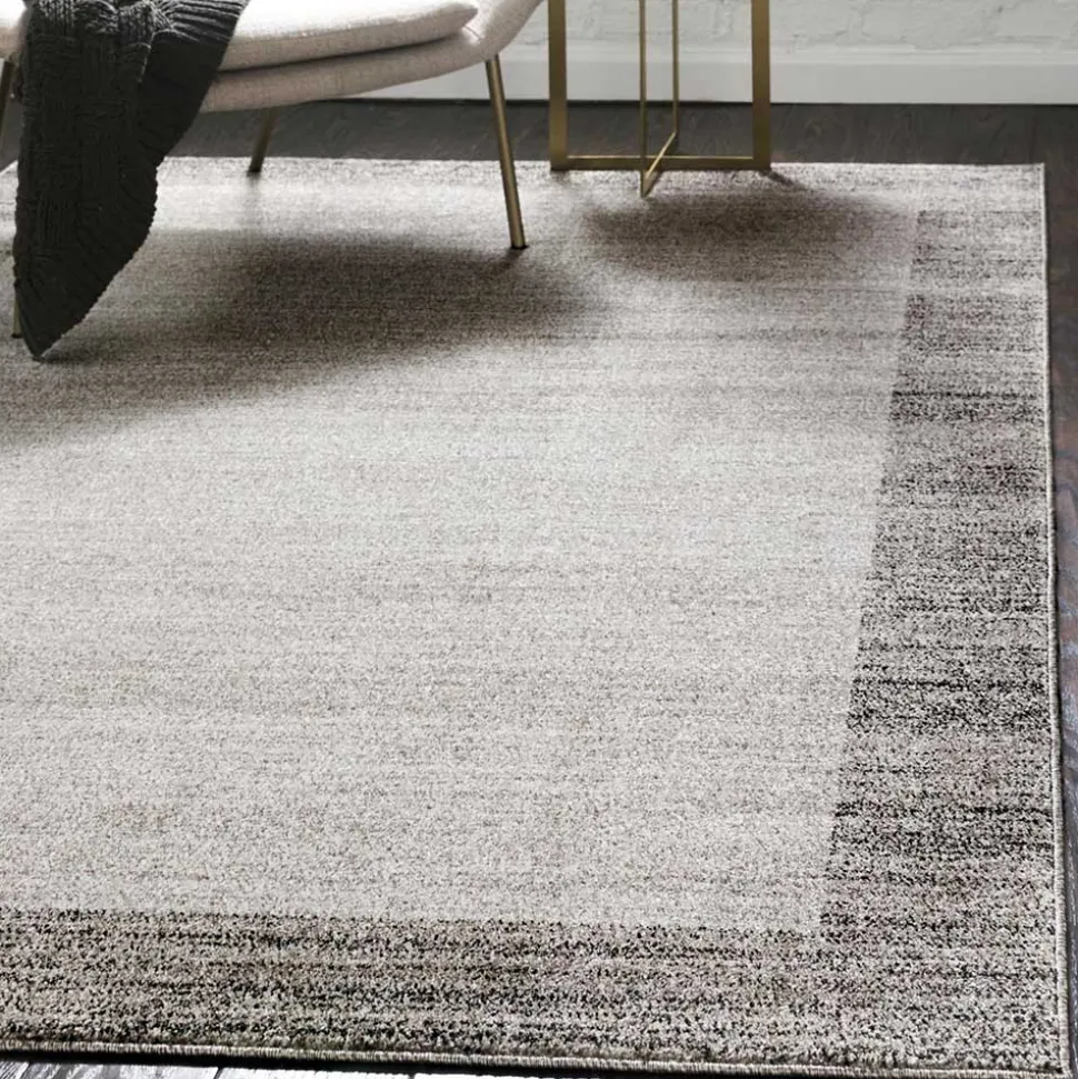 Teppich in Hellgrau mit dunkelgrauem Rand - Armina