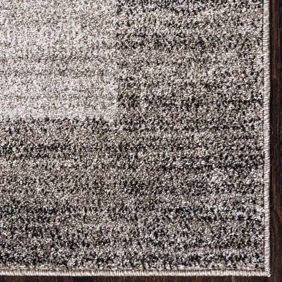 Teppich in Hellgrau mit dunkelgrauem Rand - Armina